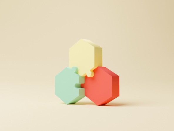 Three pastel coloured hexagonal shapes slotting together like jigsaw pieces